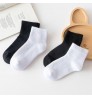 Wholesale New Black And White Color School Students Socks Soft Cotton Solid Color Children Socks