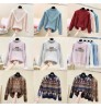 Wholesale women's sweater fashion temperament commuter round neck pullover knitted stitching sweater