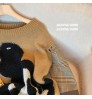 2022 spring new stitching cartoon sweater women's niche design loose lazy wind knitted top trendy